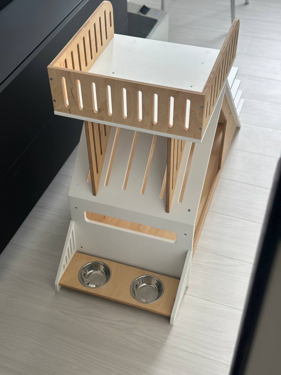 dog house with feeding station and stairs modern interior