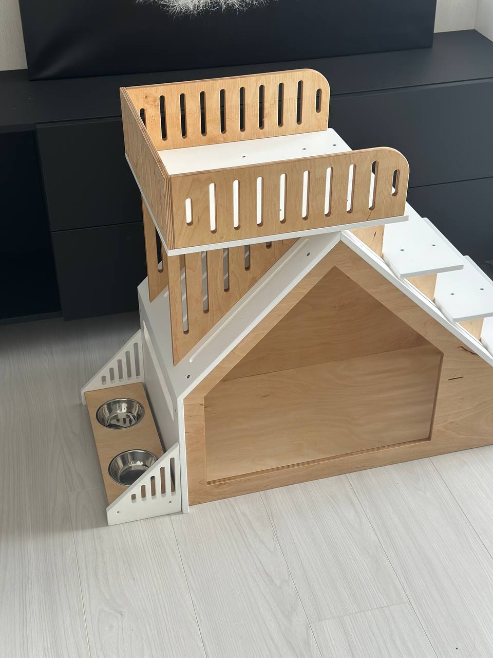 white and wooden dog house with stairs and feeding station modern indoor pet furniture