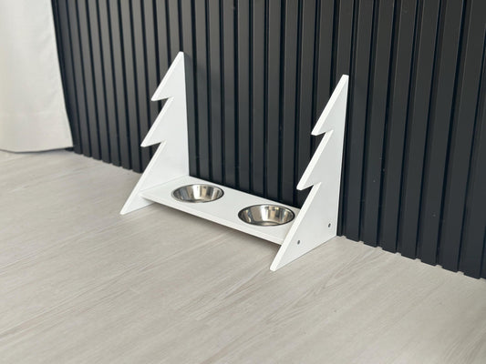 White wooden Christmas dog feeder with elevated bowls