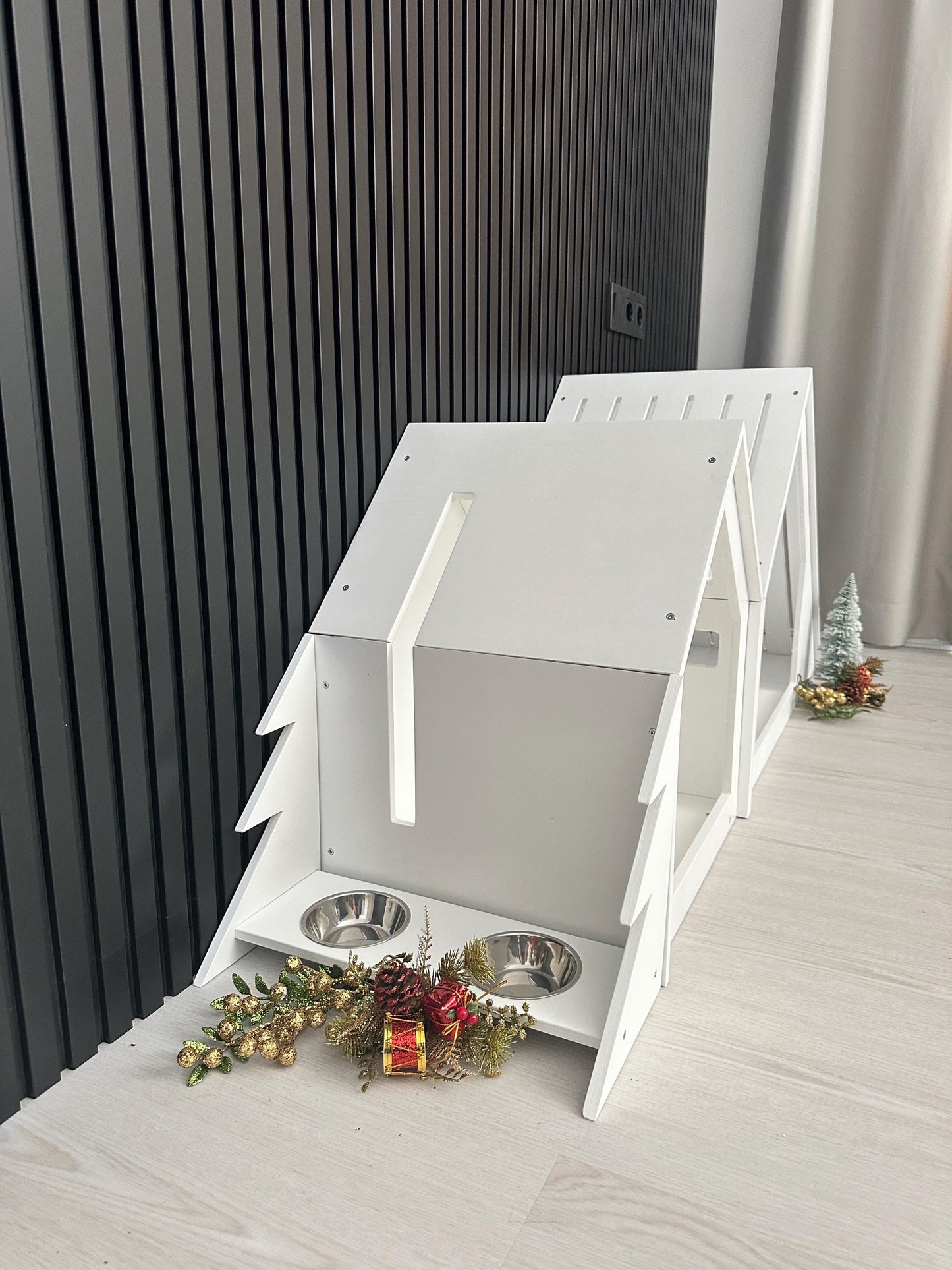 Light wood elevated dog feeder with holiday theme