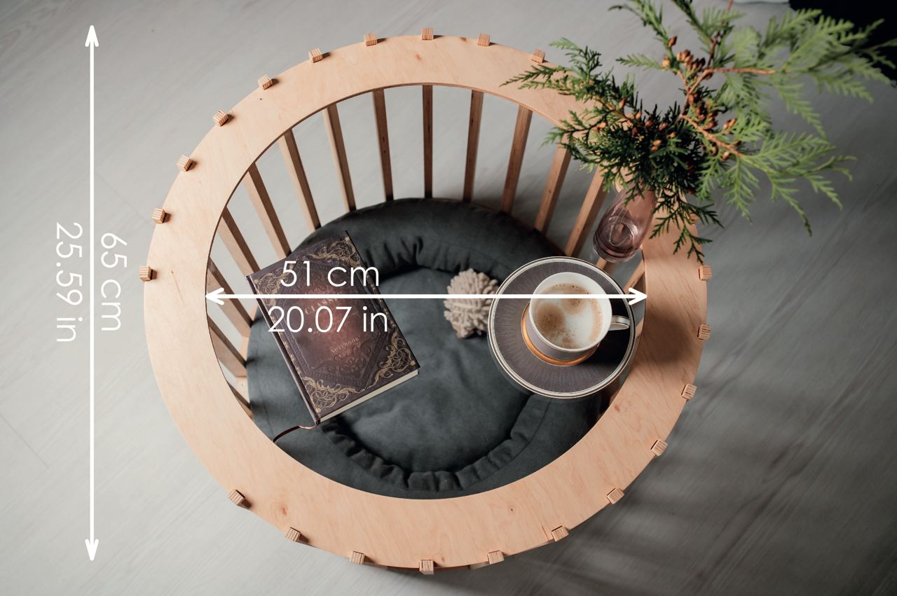 Close-up of light wooden dog crate coffee table – indoor dog furniture design.