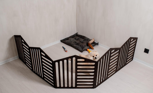 dark wooden dog playpen indoor setup with small dog