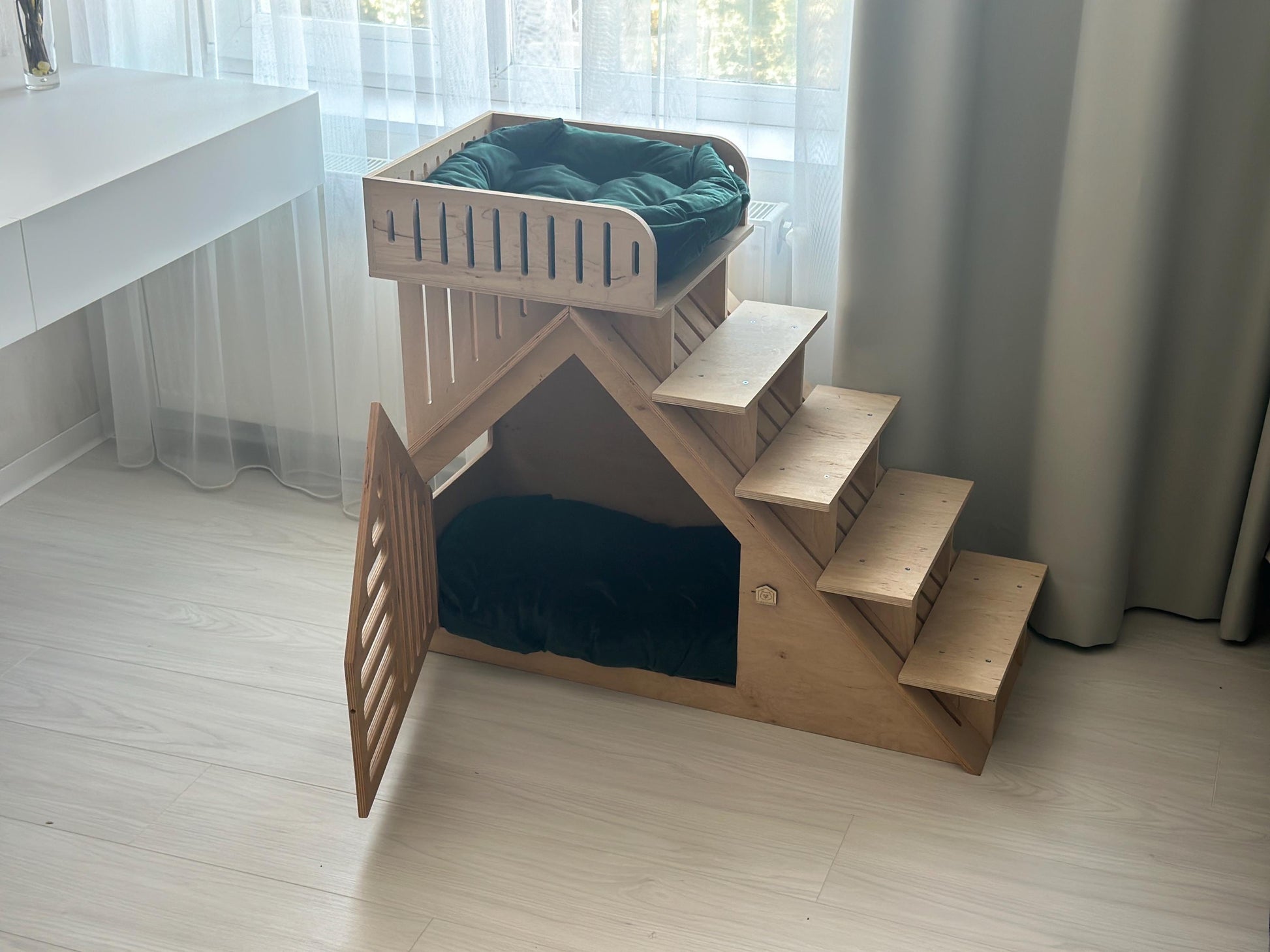 Wooden puppy steps attached to modern indoor dog house furniture