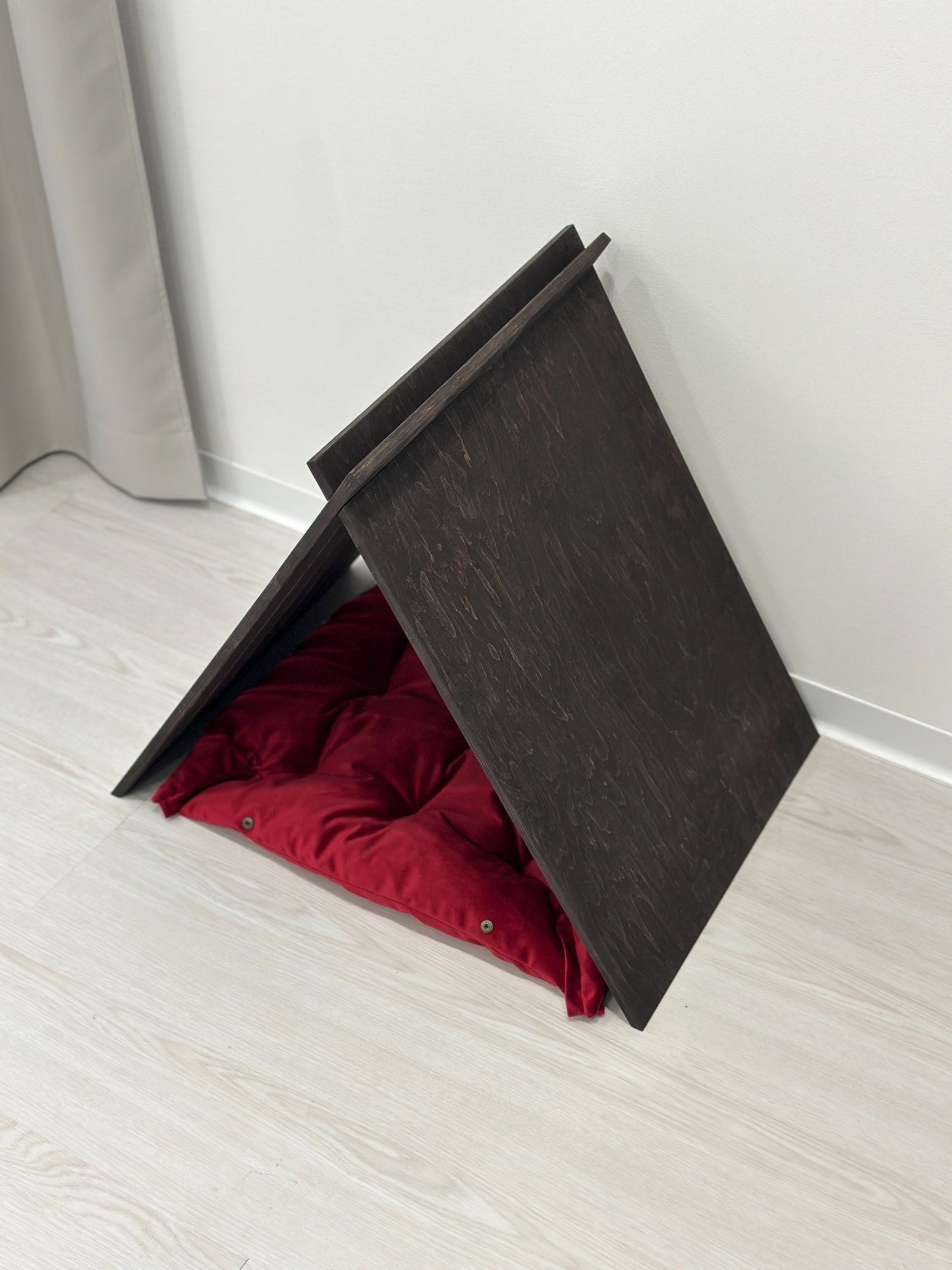 Indoor dog house with red pillow holiday inspired look