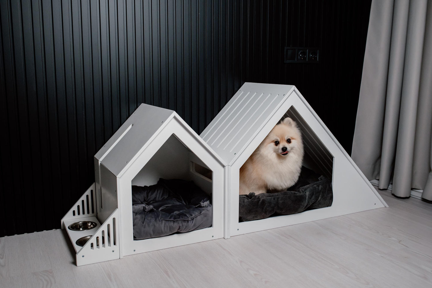 Wooden dog feeder displayed together with modern dog houses