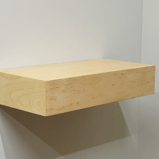 Video how the RFID hidden shelf opens with a card to access the concealed storage compartment.