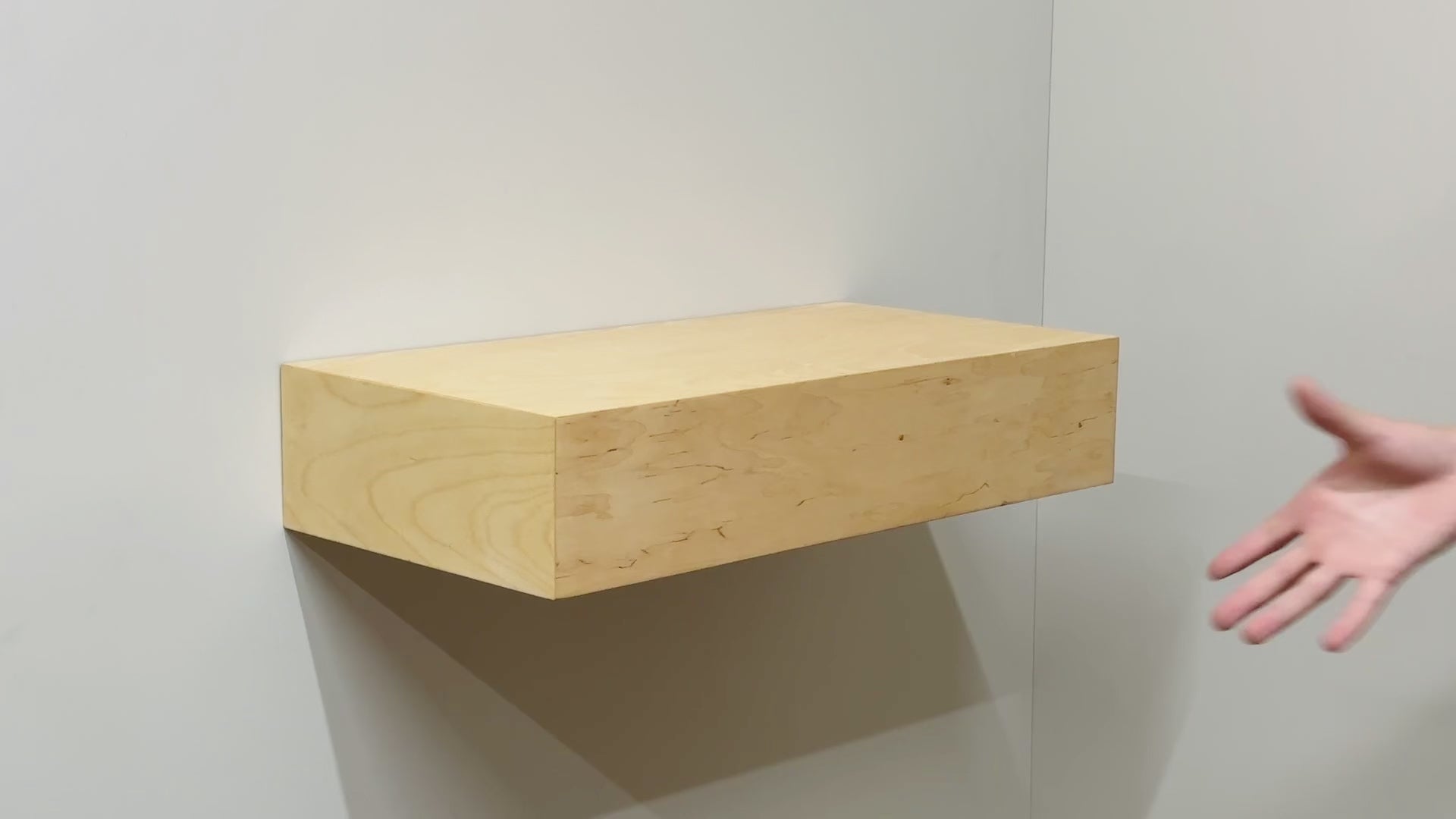 Video how the RFID hidden shelf opens with a card to access the concealed storage compartment.