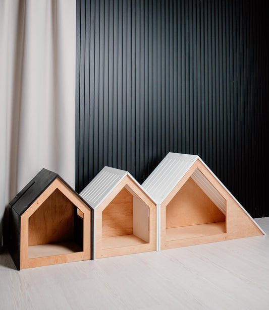 Set of 3 modern wooden dog houses for indoor use including small white, small black and large sloped roof dog house