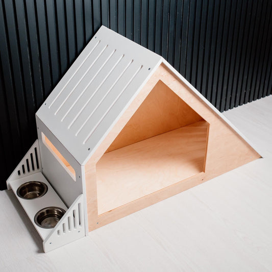 modern wooden dog house with sloped roof and feeder for small dogs