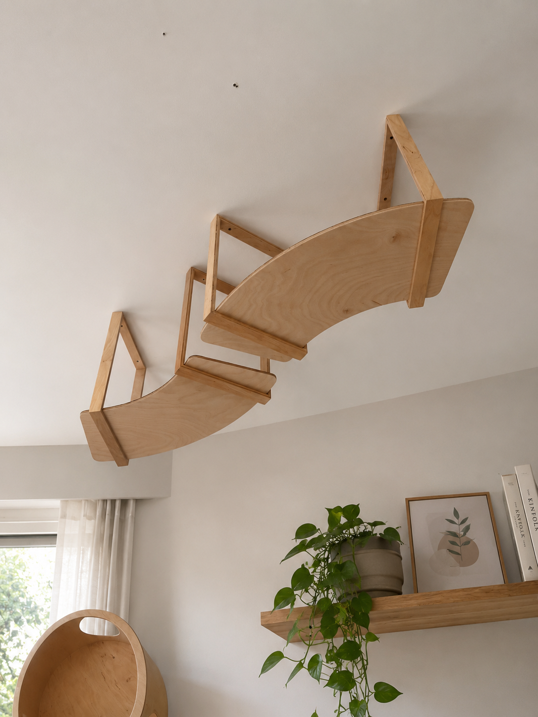 Wooden hanging cat shelves mounted from the ceiling in a modern home interior