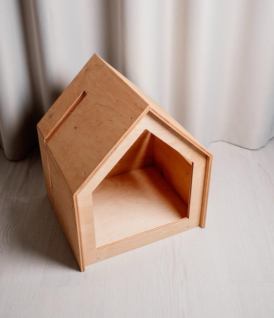 Wooden indoor dog house with open front in natural wood finish